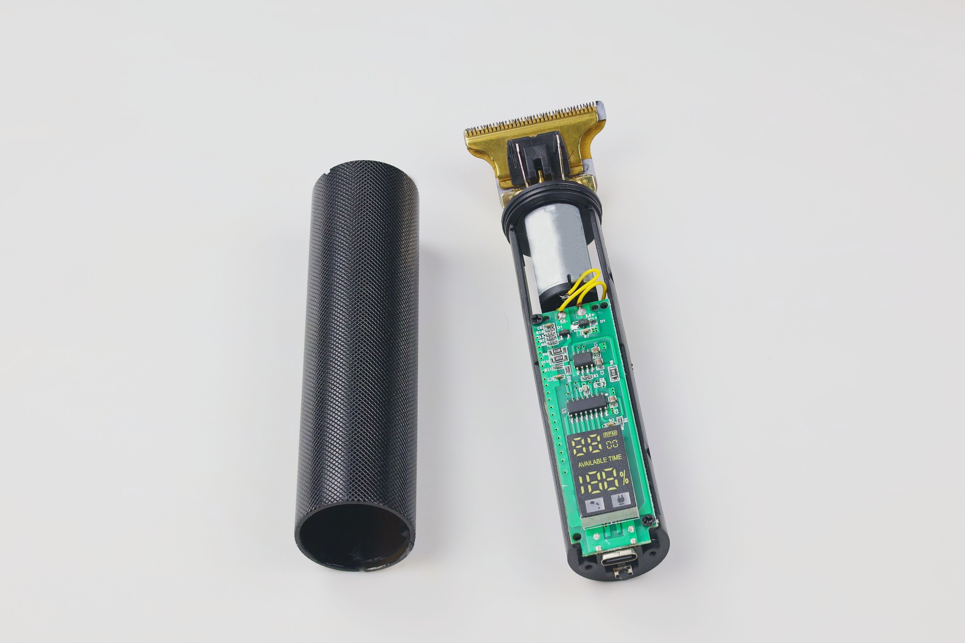 Image showing a disassembled cordless hair clipper or clipper.